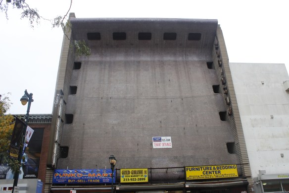 The top facade of the building housing Funko-Mart seems a good example of some terrible architectural decisions that took place in the 1960s that are still extant today.